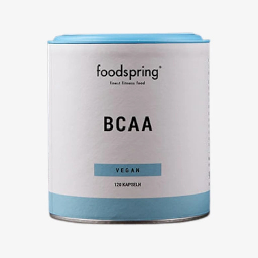 BCAA di foodspring in scatola cilindrica bianca.